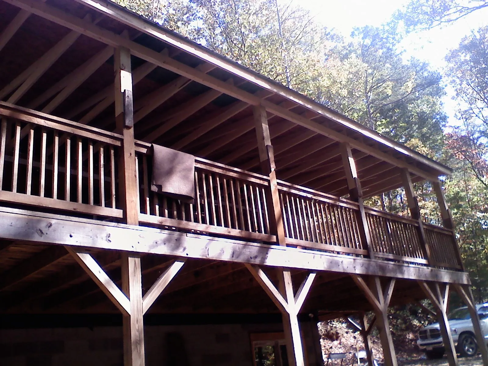 Timber framing under a new elevated porch and deck — Roof Leak Repair in North Creek by Roofing Brothers